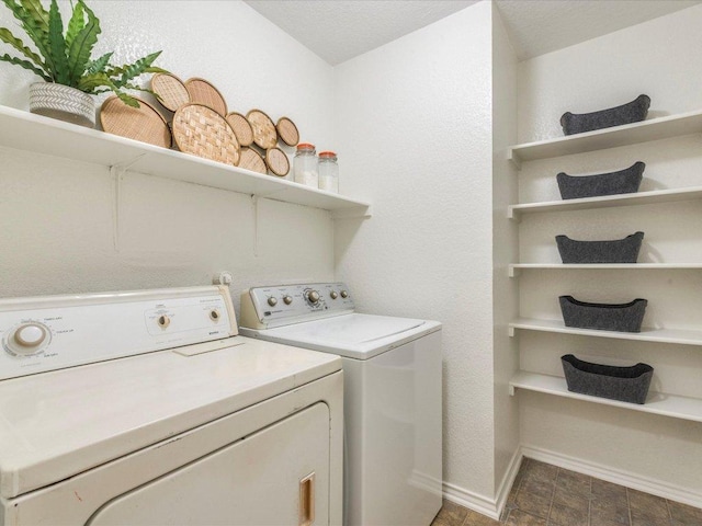 171 Beech Dr, Kyle, TX 78640 - laundry area featuring washer and dryer and baseboards