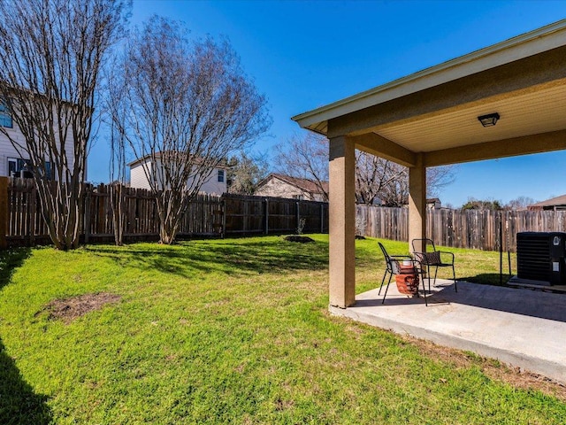 171 Beech Dr, Kyle, TX 78640 - view of yard featuring a patio area and central AC unit