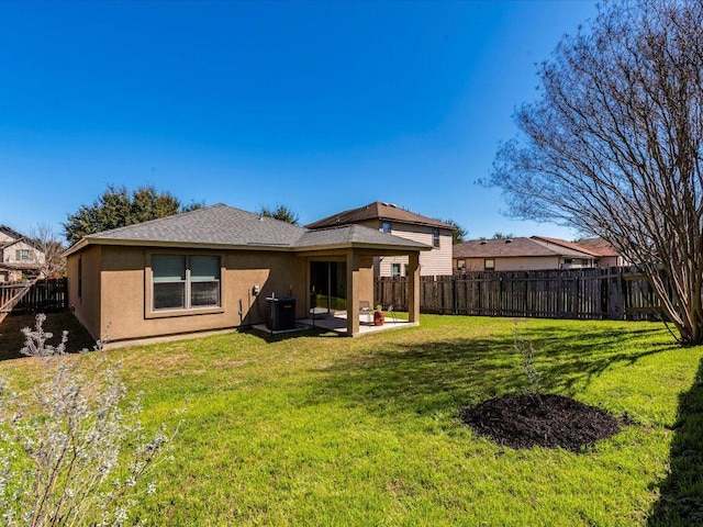 171 Beech Dr, Kyle, TX 78640 - back of property with cooling unit, stucco siding, a patio, and roof with shingles