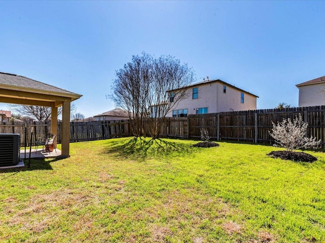 171 Beech Dr, Kyle, TX 78640 - view of yard with central AC unit and a patio