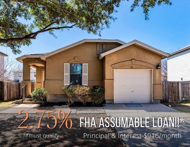 171 Beech Dr, Kyle, TX 78640 - view of front of house featuring an attached garage and stucco siding