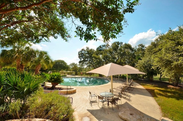 pool featuring a patio