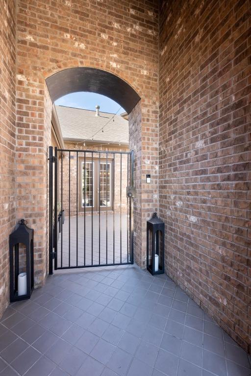 view of patio / terrace featuring a gate and french doors