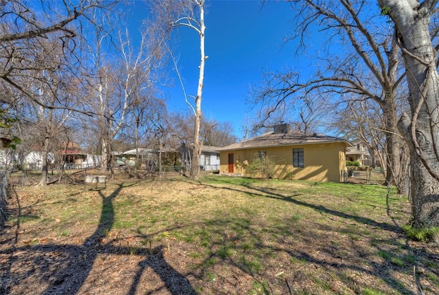 view of yard with fence