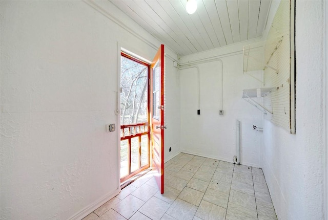 doorway featuring wood ceiling