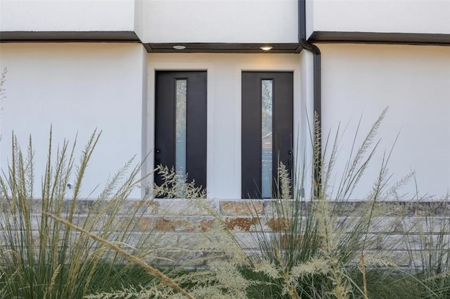 details featuring stucco siding