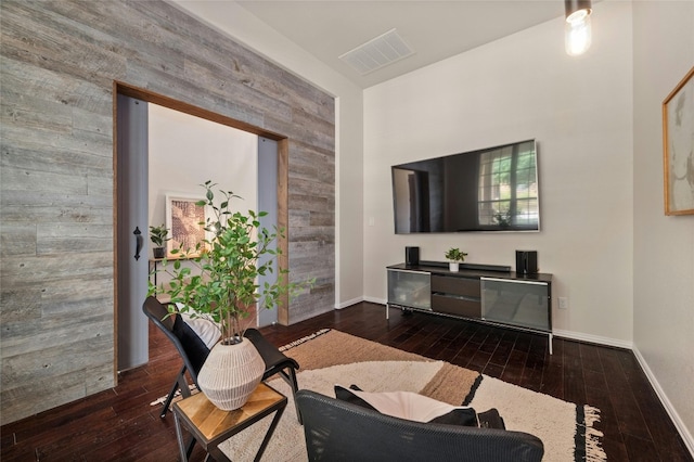 5305 Cardinal Flower Cv, Spicewood, TX 78669 - living room with hardwood / wood-style floors, baseboards, and wood walls
