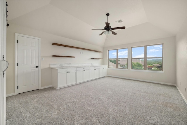 5305 Cardinal Flower Cv, Spicewood, TX 78669 - unfurnished room with lofted ceiling, a ceiling fan, light colored carpet, and baseboards
