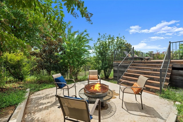 5305 Cardinal Flower Cv, Spicewood, TX 78669 - view of patio / terrace with stairs, an outdoor fire pit, and a wooden deck