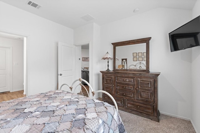 bedroom with baseboards and visible vents