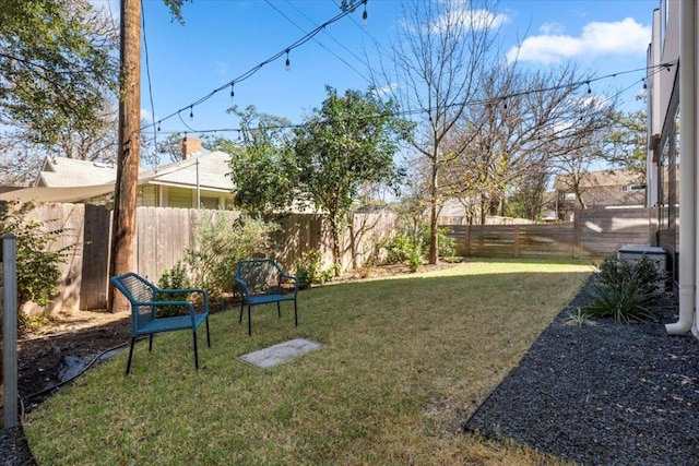 view of yard featuring a fenced backyard