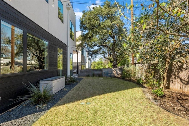 view of yard with a fenced backyard