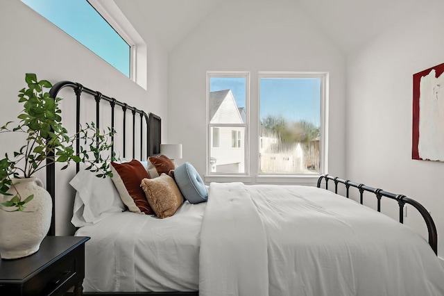 5107 Menchaca Rd Unit 11, Austin, TX 78745 - bedroom featuring multiple windows and lofted ceiling