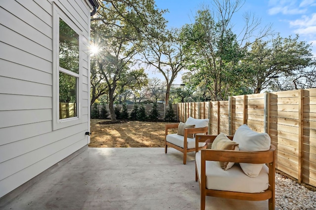 view of patio with a fenced backyard