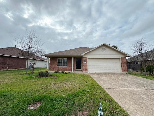 ranch-style house with a garage, brick siding, concrete driveway, and a front yard