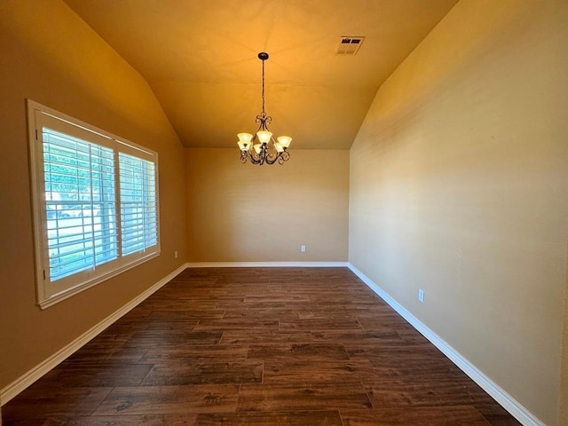 627 Columbine Ave, Cedar Park, TX 78613 - empty room with vaulted ceiling, dark wood-type flooring, a chandelier, and baseboards