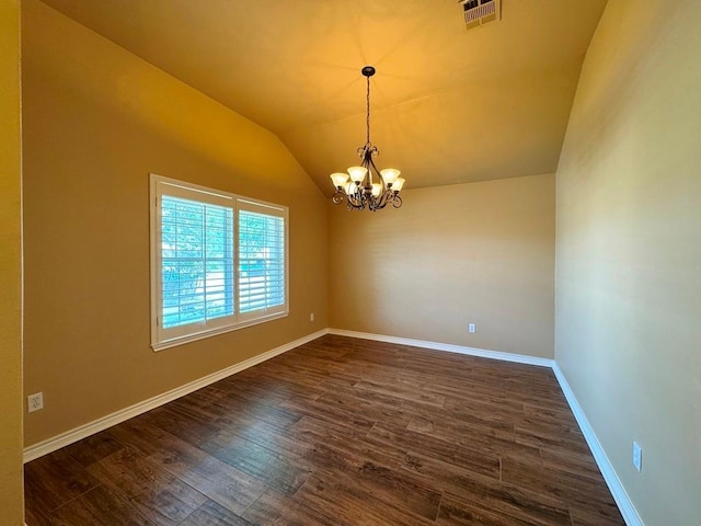 627 Columbine Ave, Cedar Park, TX 78613 - spare room featuring a chandelier, dark wood-style flooring, lofted ceiling, and baseboards