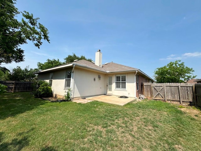 627 Columbine Ave, Cedar Park, TX 78613 - rear view of house featuring a patio area, a chimney, and a gate