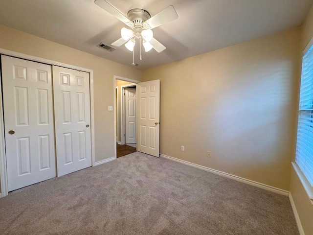 627 Columbine Ave, Cedar Park, TX 78613 - unfurnished bedroom with carpet flooring, baseboards, a closet, and ceiling fan