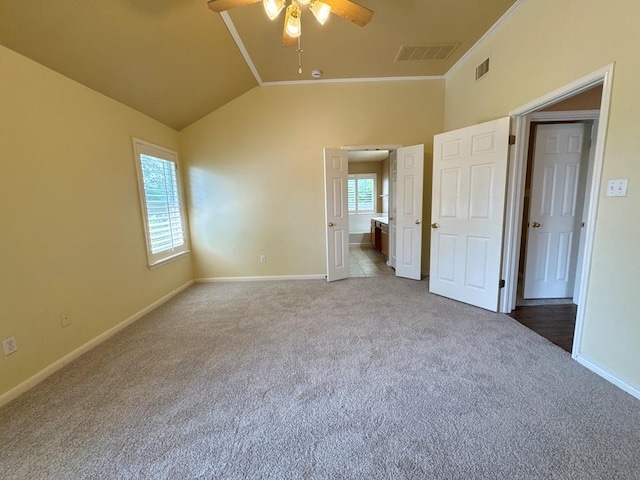 627 Columbine Ave, Cedar Park, TX 78613 - unfurnished bedroom featuring carpet floors, lofted ceiling, baseboards, and connected bathroom