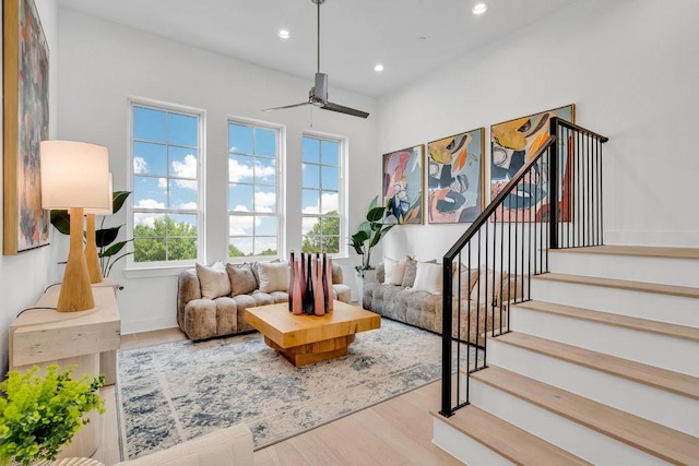 276 Pullman Ct, Round Rock, TX 78664 - living area featuring stairs, a ceiling fan, recessed lighting, and wood finished floors