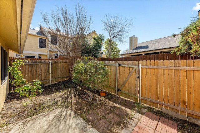 11901 Swearingen Dr Unit 103, Austin, TX 78758 - view of yard featuring a patio and a gate