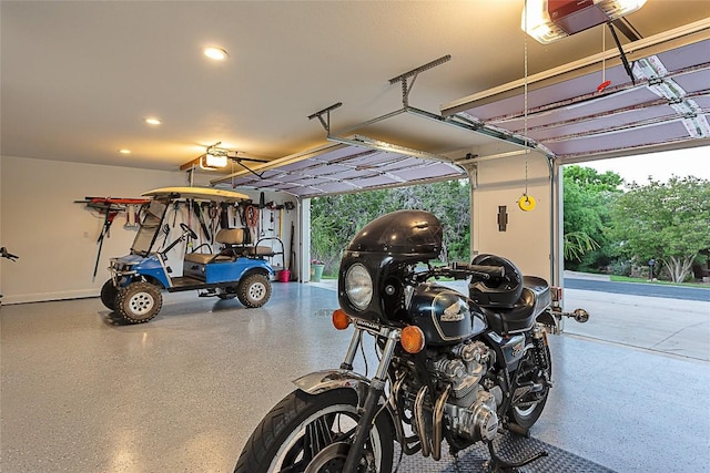 5608 Arroyo Rd, Austin, TX 78734 - garage with a garage door opener and recessed lighting