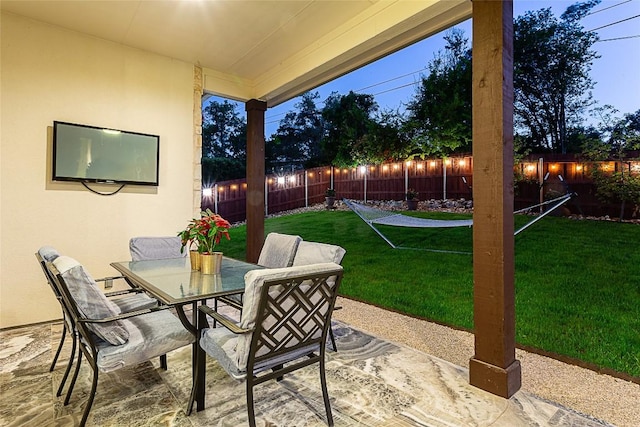 5608 Arroyo Rd, Austin, TX 78734 - fenced backyard featuring outdoor dining space and a patio area