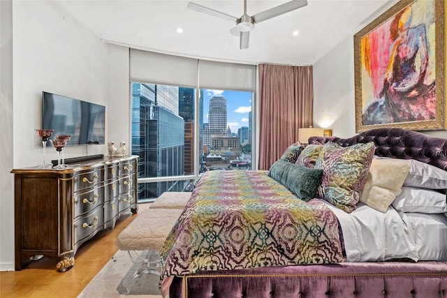 bedroom with access to outside, recessed lighting, a ceiling fan, and light wood-style floors