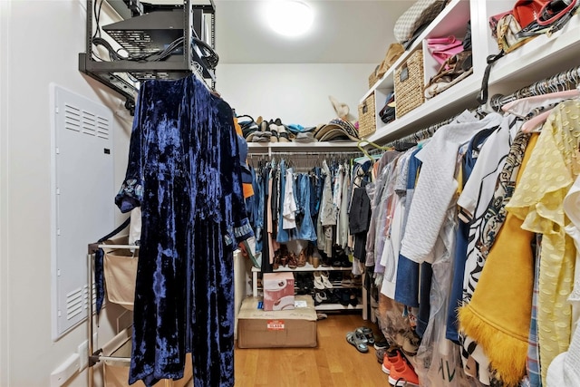 spacious closet with wood finished floors