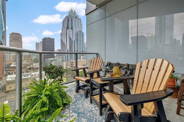 balcony featuring a view of city