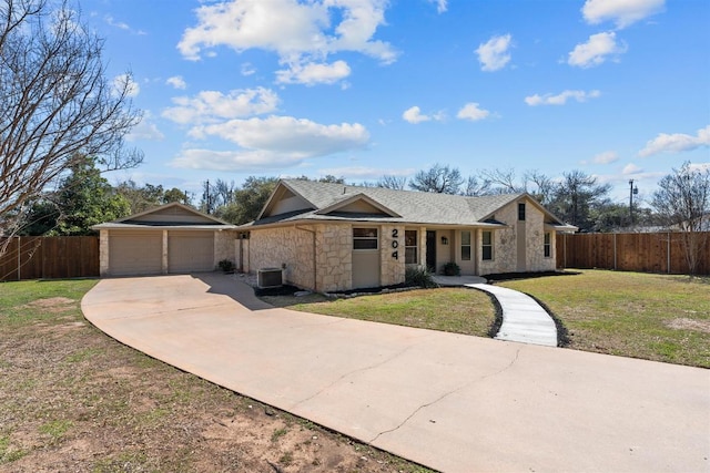 single story home with cooling unit, a shingled roof, a front yard, and fence