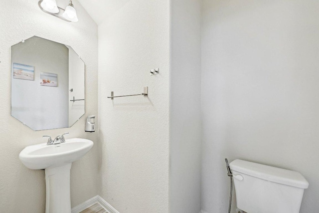 20417 Whimbrel Ct, Pflugerville, TX 78660 - bathroom featuring toilet and a sink