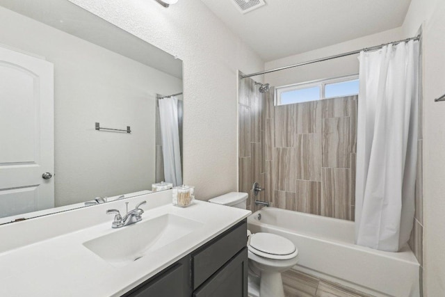 20417 Whimbrel Ct, Pflugerville, TX 78660 - bathroom featuring vanity, toilet, and shower / tub combo