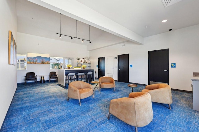20417 Whimbrel Ct, Pflugerville, TX 78660 - living room with carpet, baseboards, beamed ceiling, and recessed lighting