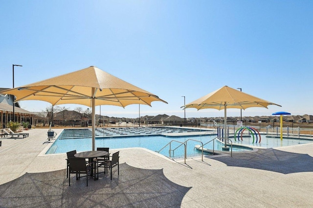 20417 Whimbrel Ct, Pflugerville, TX 78660 - community pool with a patio