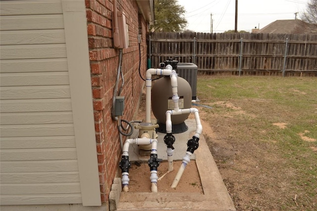 exterior details with fence and central AC