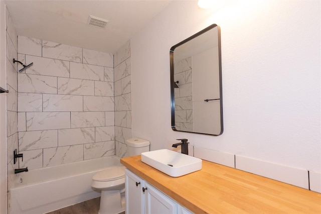 121 Winecup Path, Cedar Creek, TX 78612 - full bath with vanity,  shower combination, and wood finished floors