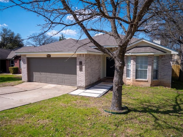 ranch-style house with concrete driveway, brick siding, an attached garage, and a front yard