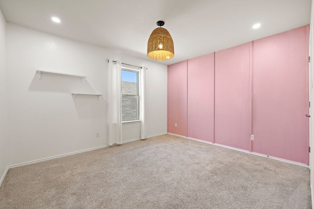 empty room featuring carpet floors and recessed lighting