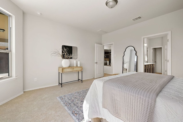 bedroom featuring baseboards, visible vents, and carpet flooring