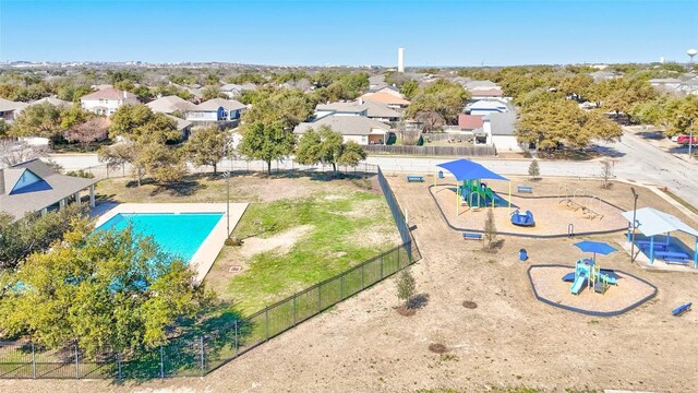 17616 Strontian Pass, Pflugerville, TX 78660 - aerial perspective of suburban area with a park and a pool area