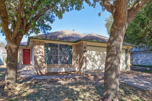 17616 Strontian Pass, Pflugerville, TX 78660 - single story home with driveway and a garage
