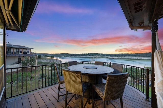 deck featuring a water view