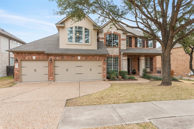 traditional-style house with stone siding, brick siding, driveway, and roof with shingles