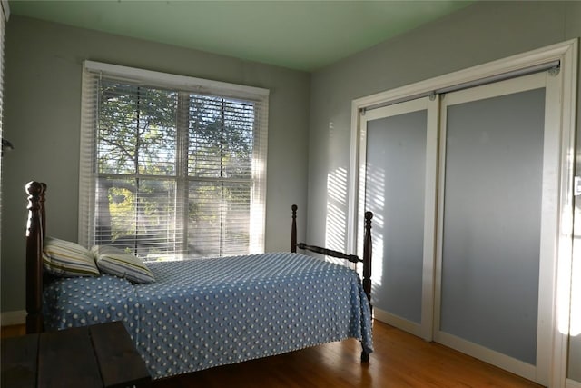 4708 Shoalwood Ave, Austin, TX 78756 - bedroom featuring wood finished floors and baseboards