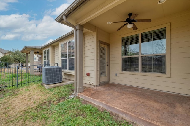 exterior space featuring a ceiling fan, central AC, fence, and a patio