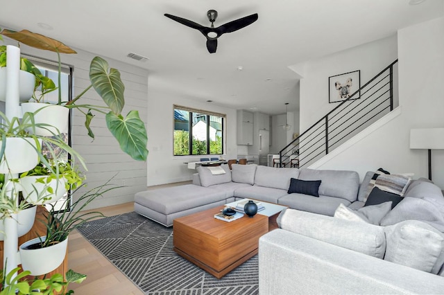 1712 Nash Ave Unit A, Austin, TX 78704 - living area featuring a ceiling fan, stairway, and wood finished floors