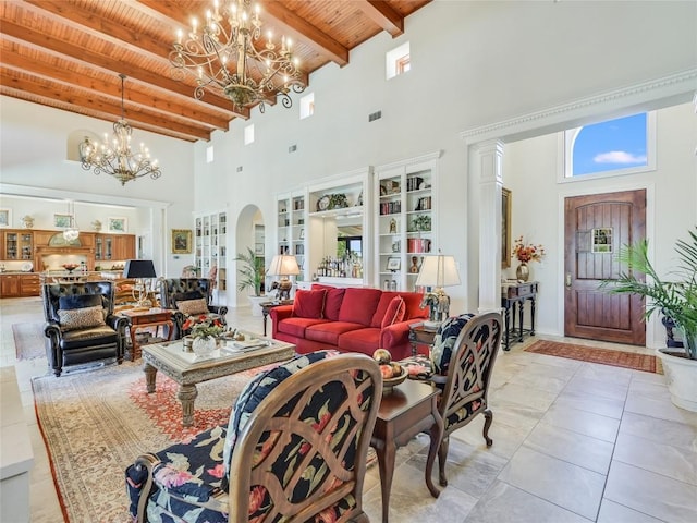living room with a high ceiling, visible vents, wooden ceiling, beamed ceiling, and a notable chandelier