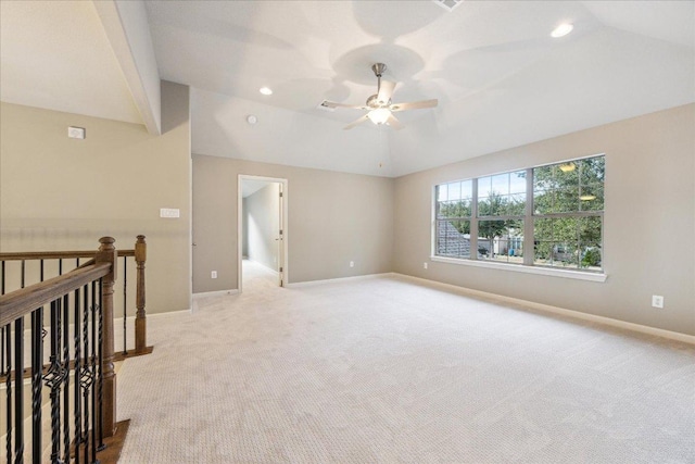 empty room featuring light carpet, baseboards, ceiling fan, vaulted ceiling, and recessed lighting